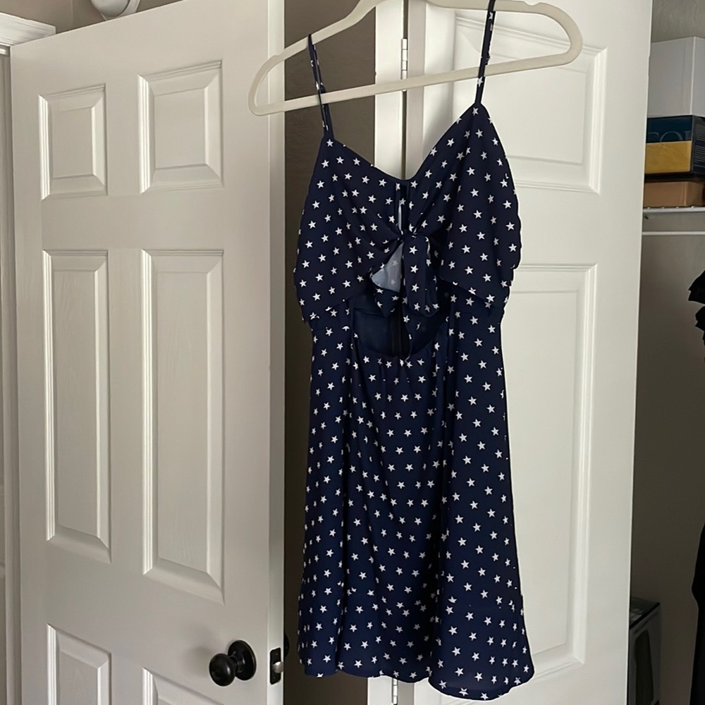 Strappy Mini Dress with Star Print with middle opening. Worn once like new.